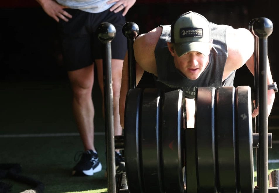 Man training with coach